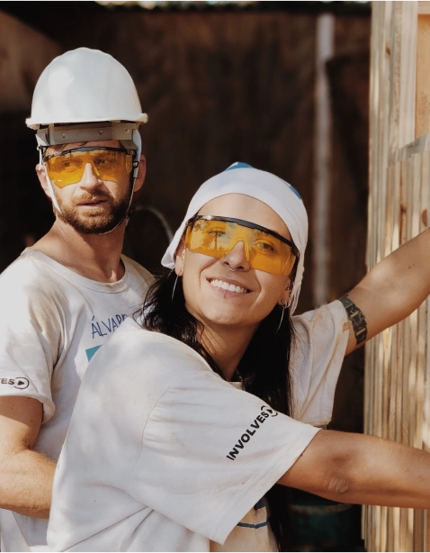 inspector pair with protective gear holding walls